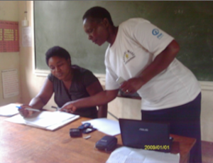 A SKImfi entrepreneur completes the loan process.